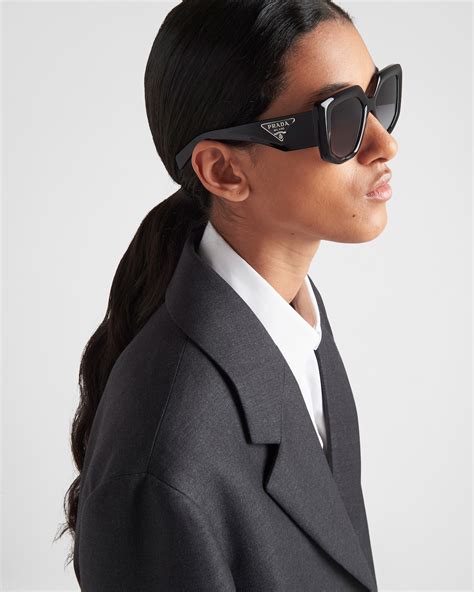 prada curved sunglasses|prada sunglasses models.